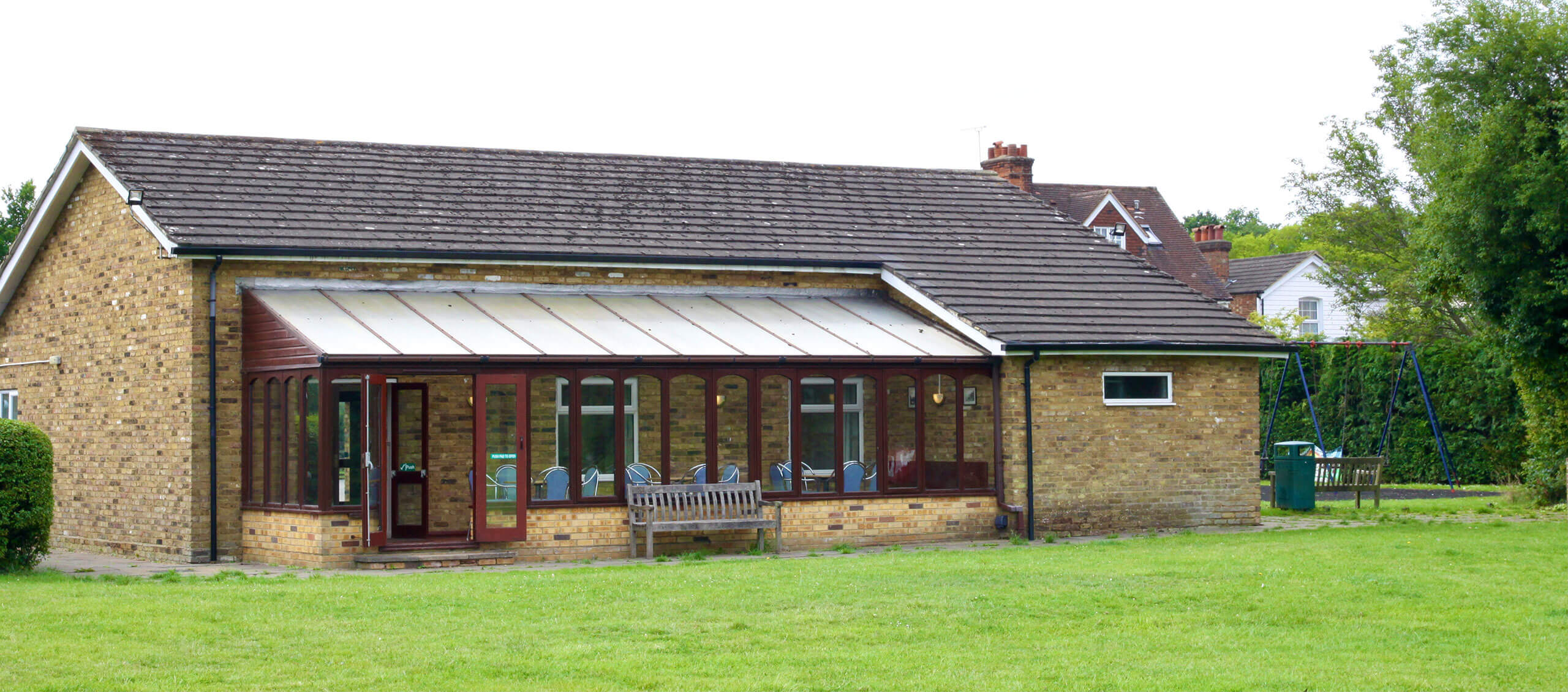 Charles Morris Hall and the rear conservatory, pictured from the playing field,